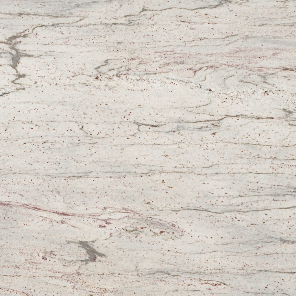China White granite trắng sữa, chấm đỏ nâu li ti, vân xám mảnh như nét thủy mặc. Thanh nhã cho bếp, phòng tắm, lát sàn. Vistones Global.