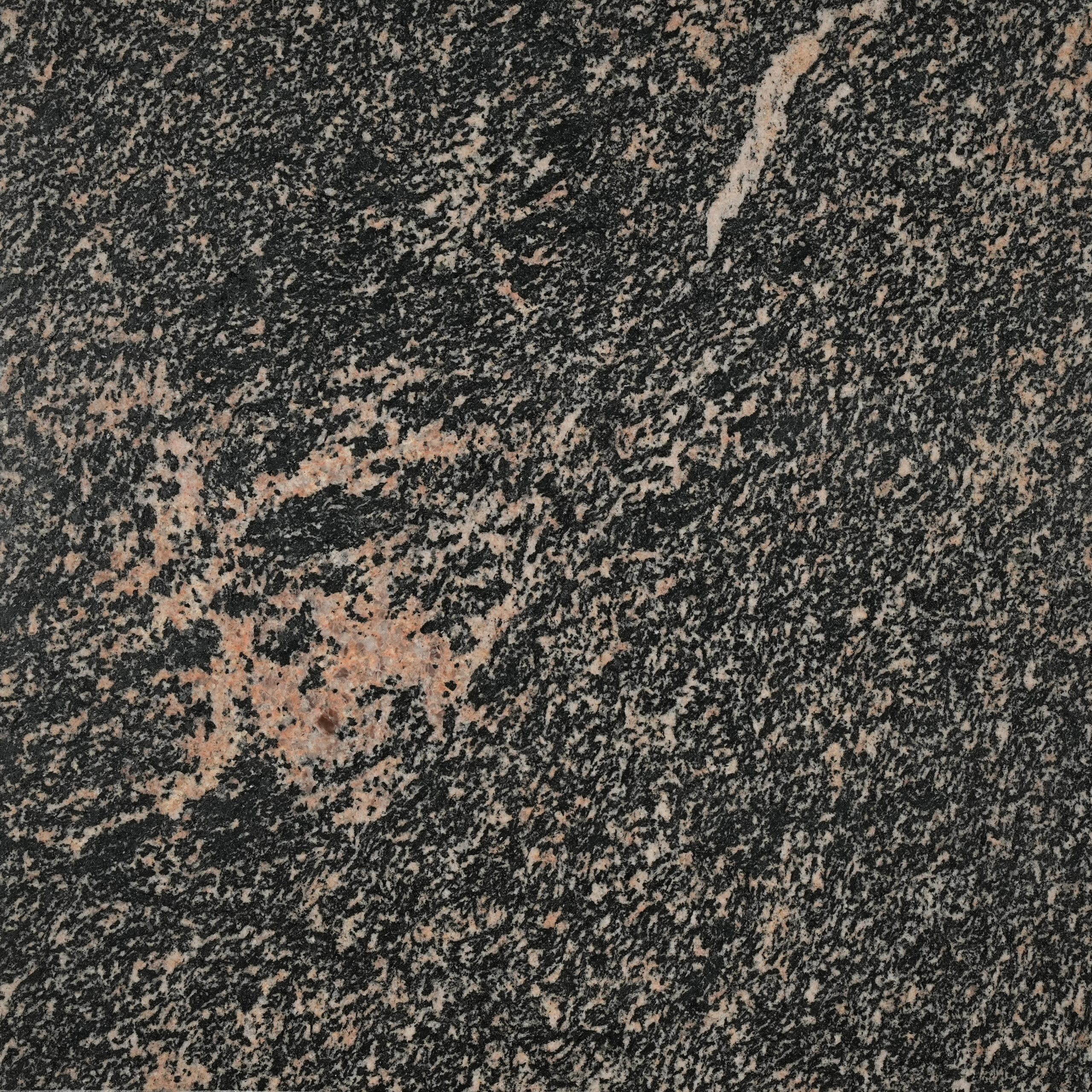 Black Cobra granite nền đen huyền bí điểm mảng hồng cam nổi bật, cá tính mạnh mẽ. Ứng dụng mặt bếp, quầy bar, ốp tường, lát sàn. Vistones Global.
