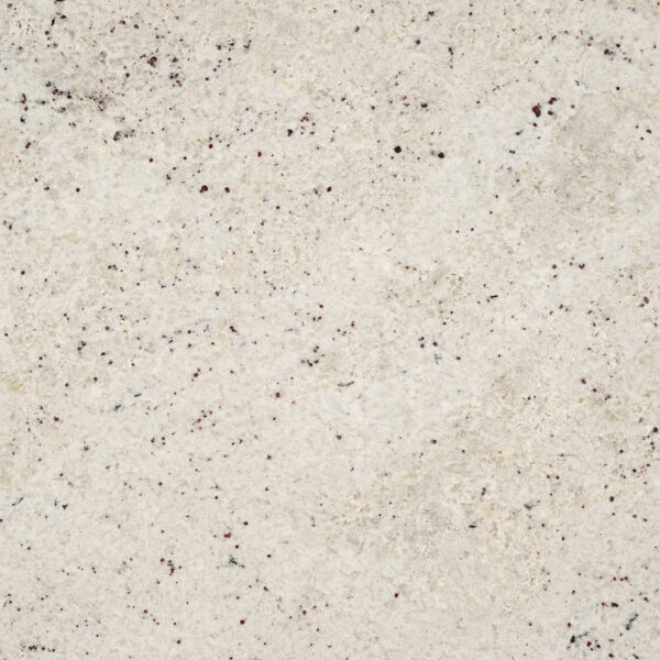 Colonial White granite nền trắng kem tinh khôi, điểm hạt garnet đỏ rượu li ti. Hoàn hảo cho bếp, phòng tắm, không gian sáng. Xem tại Vistones.