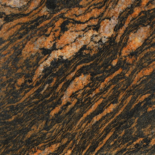 Fusion Gold granite dải cam đồng cuộn xoáy trên nền đen, tinh thể kem lấp lánh. Táo bạo cho mặt bếp, quầy bar, ốp tường. Liên hệ Vistones.