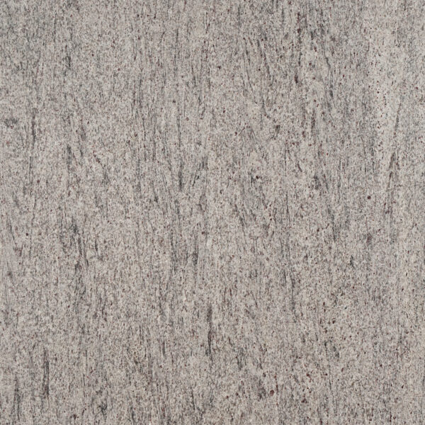 Silky Silver granite xám nhạt mịn, vân dọc mảnh như tia mưa, chấm đỏ nâu li ti. Dễ phối mọi phong cách, cho bếp, lavabo, lát sàn. Vistones Global.